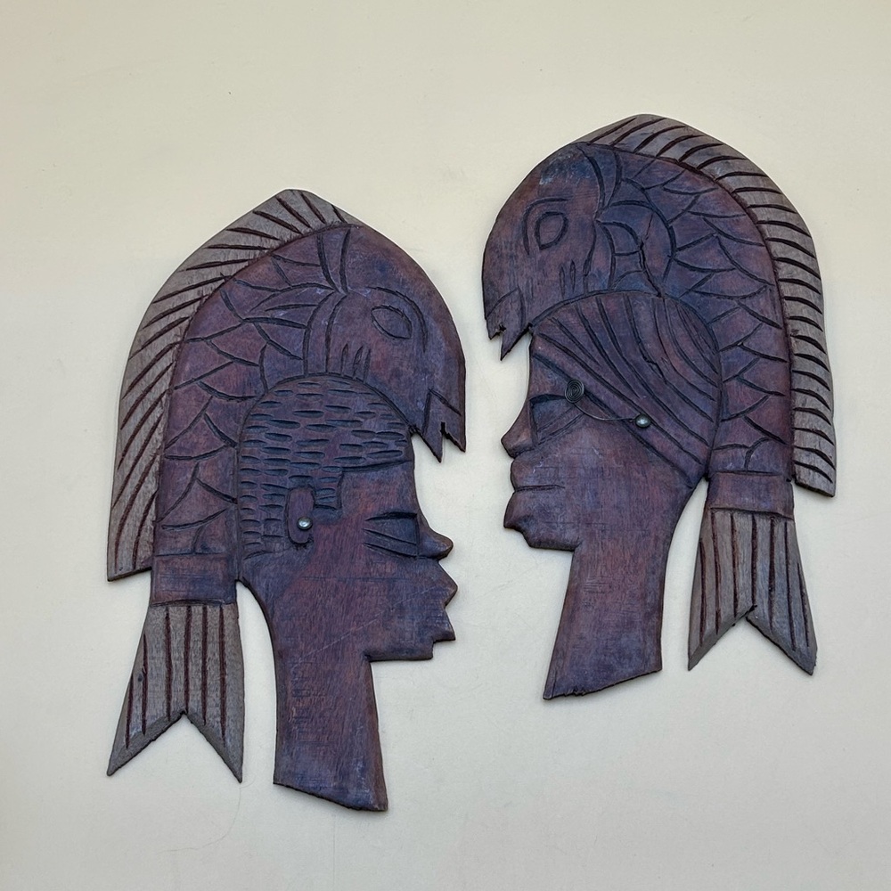 African hand carved wood tribal man with fish head, head wear  wall art